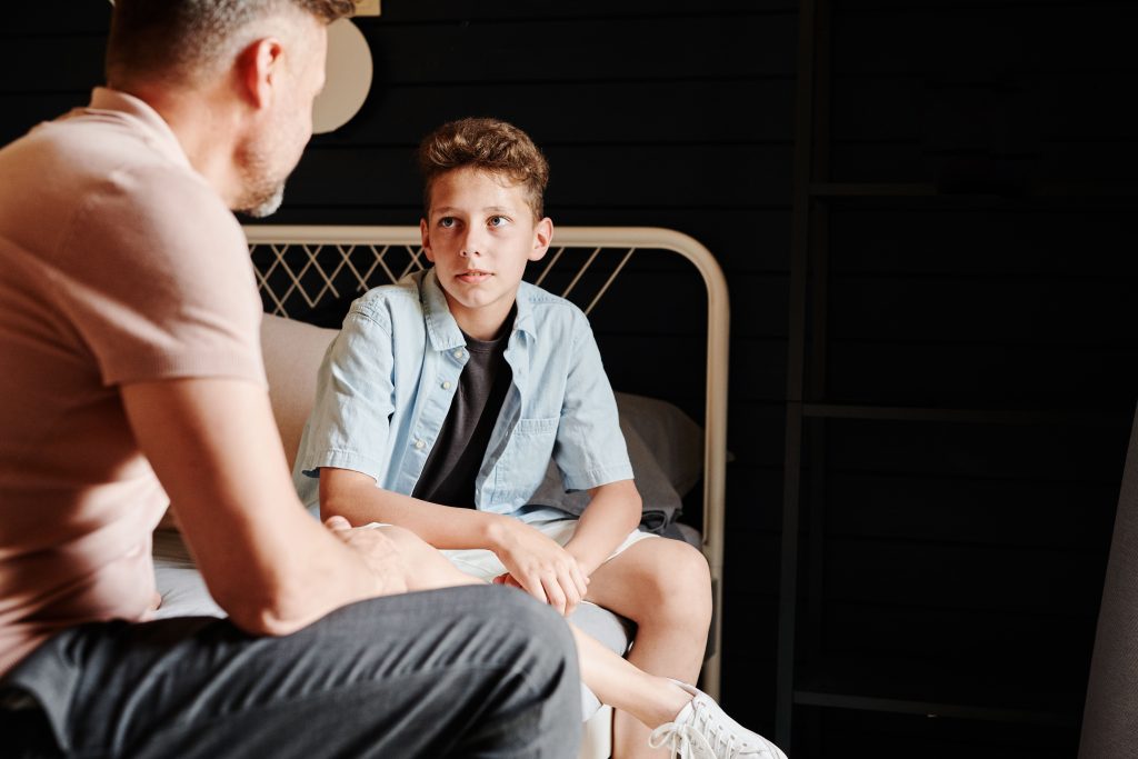 dad-and-teen-son-having-a-conversation