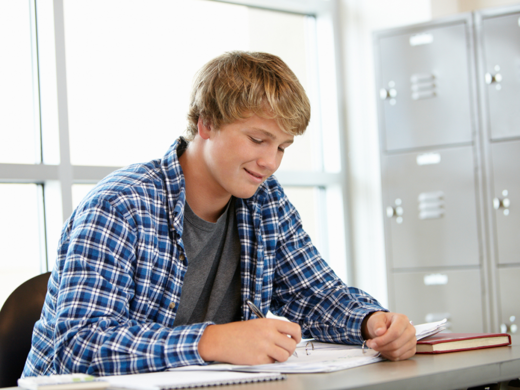 male-teenager-studying-for-better-marks